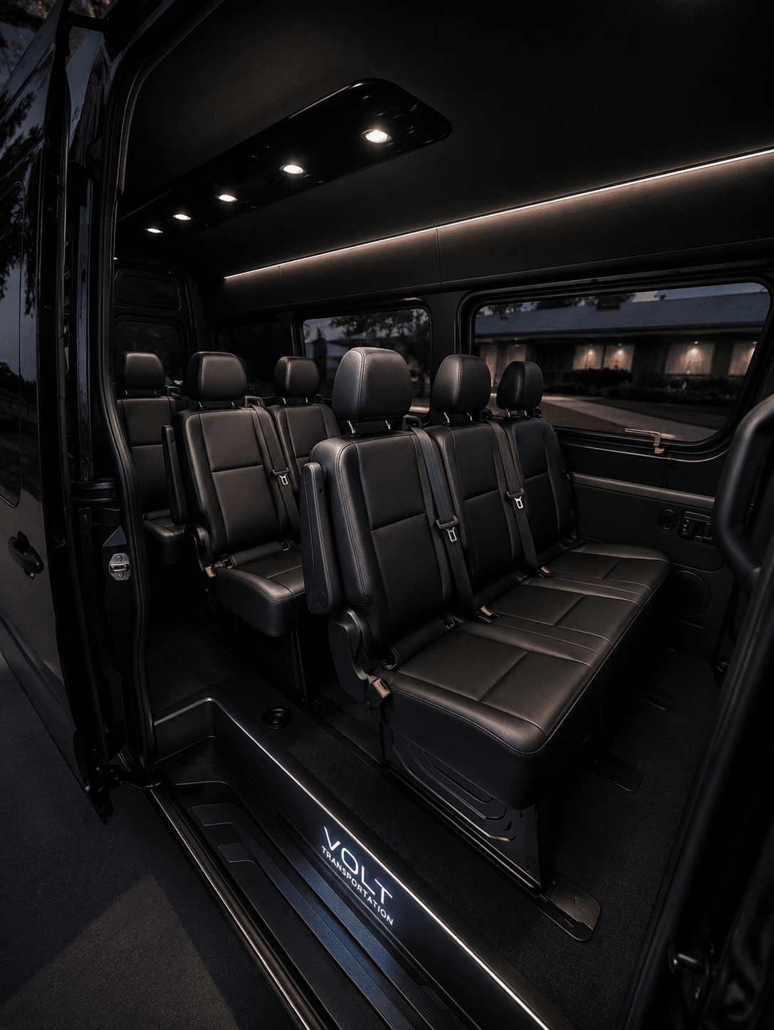 Plush leather interior of a Volt black Mercedes Sprinter van